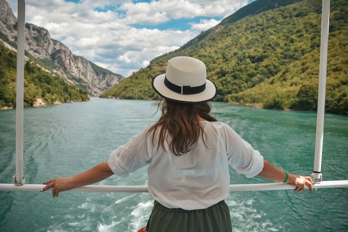 A tourist on a cruise on Lake Koman in Albania