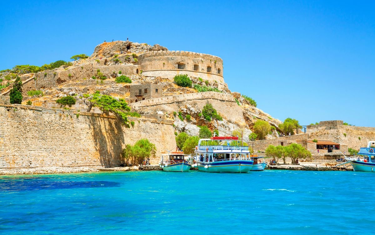 A boat heading to Spinalonga in Greece