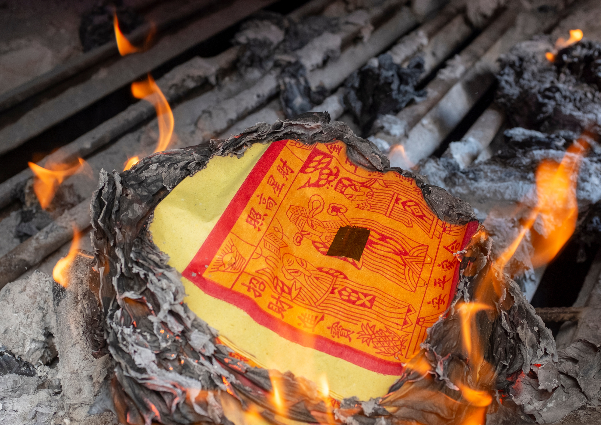 Joss paper burning Hong Kong Street